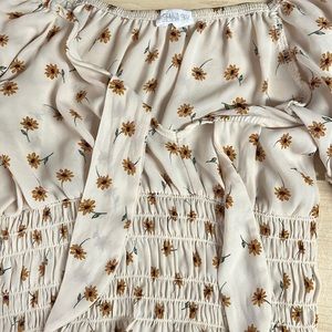 I’m selling a top from the brand Sienna Sky.